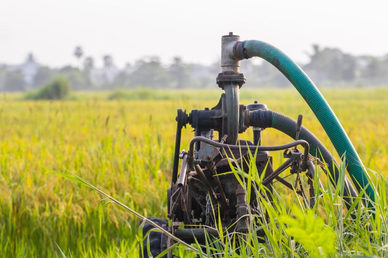 Submersible irrigation water pump in a field