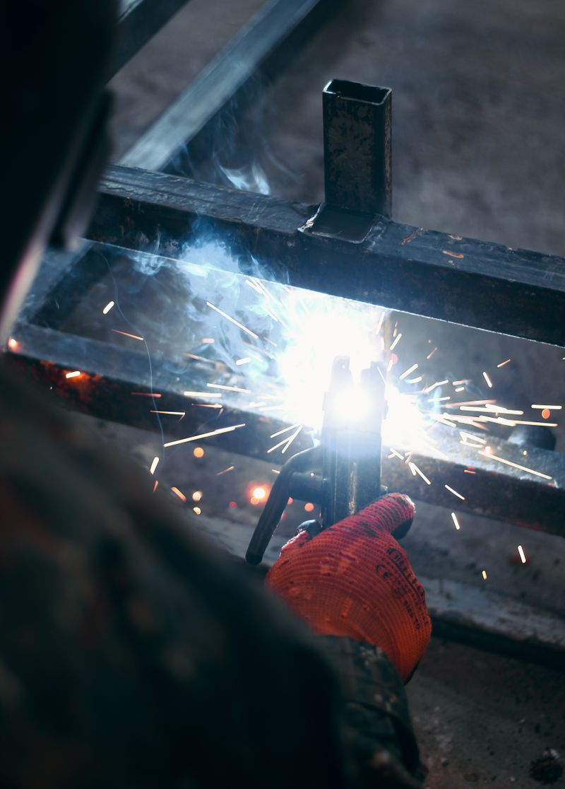Industrial welding with sparks and cable